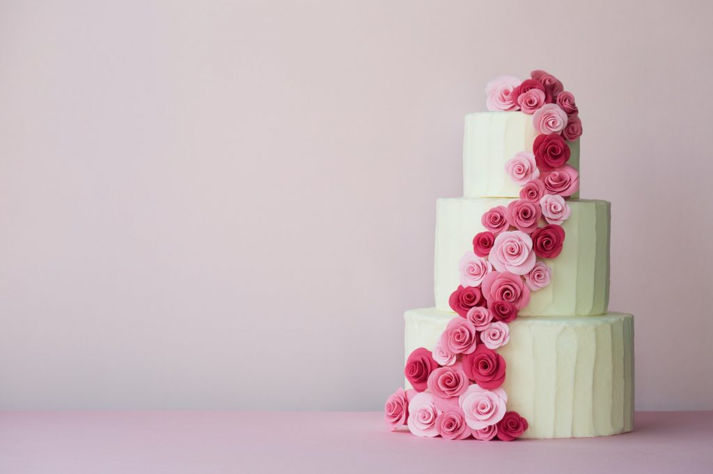 Tiered wedding cake with sugarpaste roses